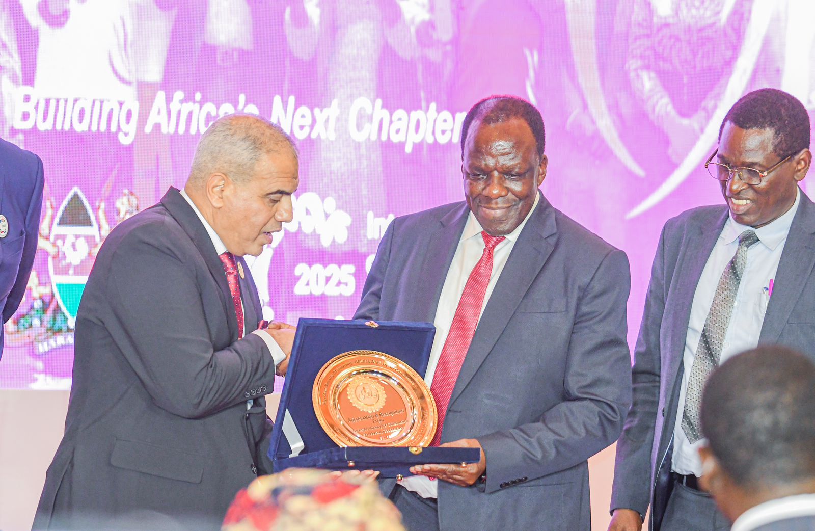 Cabinet Secretary Co-operatives and MSMEs Development alongside various dignitaries showcase award